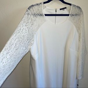 TOMMY HILFIGLER. white dress with lace detail on the sleeves.